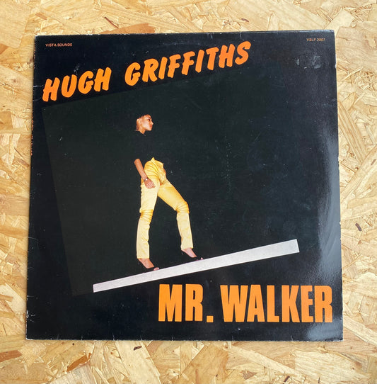 Hugh Griffiths  – Mr. Walker